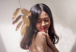 Woman Wearing Brown Sleeveless Top